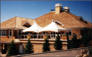 Two MQ1020 Marquee Tents providing shade on a house patio