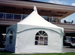 White 20x20 Peak Marquee Tents with french window walls used for golf cart storage
