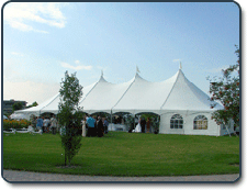 Warner Shelter Systems Ltd. Party Tent, outside White Peak Pole Tent, 40x100, decorated for wedding