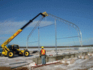 WSSL GIGA-SPAN Tent, CNRL, setting up the large portable structure with crane