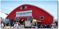 Fully customized gable end on a Giga-Span to bring a red barn feel, Calgary Stampede