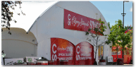 Custom 32' X 5' red banner and 2 red walls on a WSSL MOD 3X for the Calgary stampede store