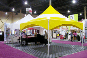 WSSL Trade Show MQ15 Peak Marquee Tent with Yellow and White Canopy at an indoor Trade Show venue