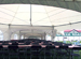 Interior view of a group of White Hexagonal Peak Marquee Tents linked with gutters