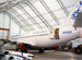 GIGA-SPAN Tent, Series 43, inside the airplane hangar portable structure with plane