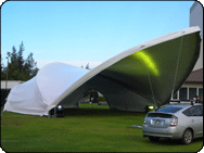Stagecover, band shell, arabesque saddle shape span 41