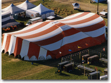 Outside view of 1986 red and white striped world plowing match tents