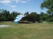 WSSL Arabesque Stage Cover Tent, model SA56, stage cover tent being setup for a festival